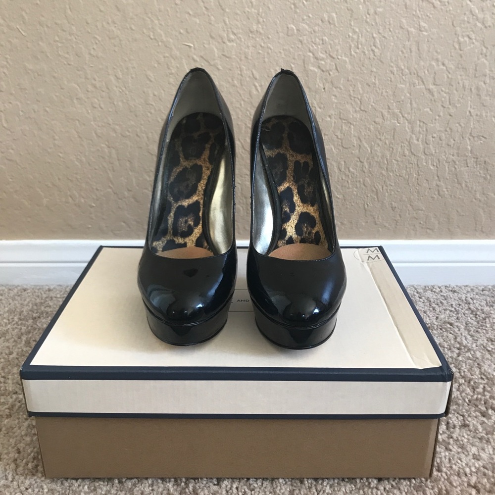 Bebe black platform pumps